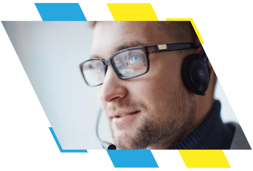 IT help desk manager with headset helping a client