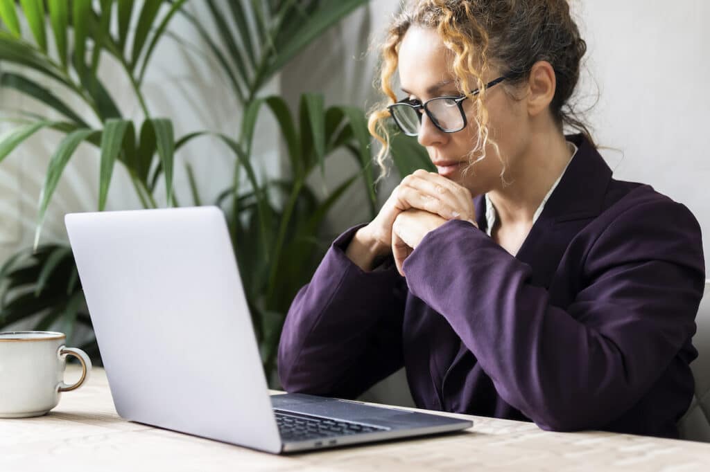 woman scans email for email security purposes