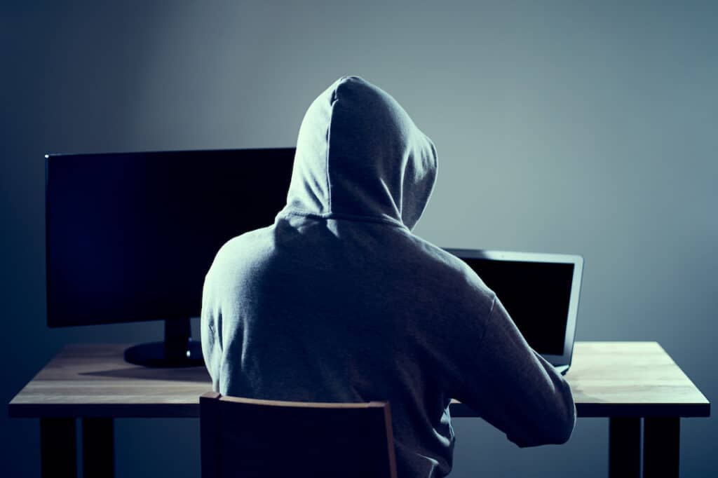 male hacker using session hijacking