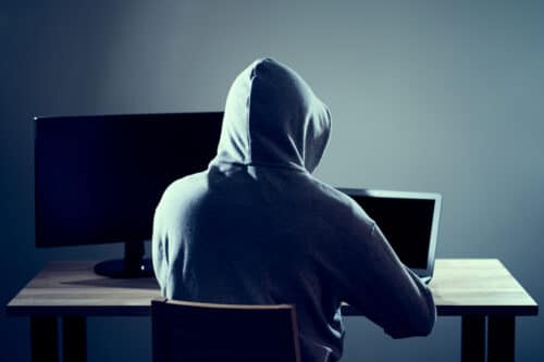 male hacker using session hijacking